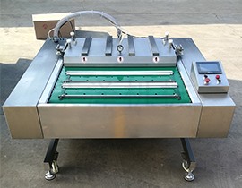 江蘇客戶訂購滾動式真空包裝機